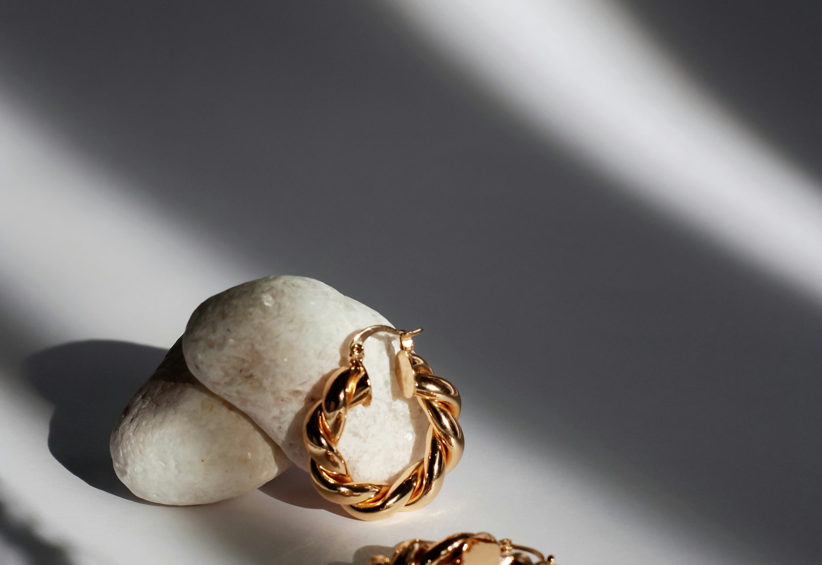 Gold jewellery, carefully arranged